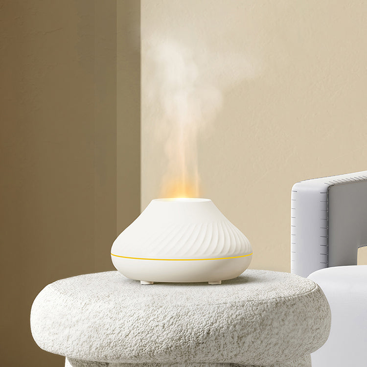 Volcano Flame Aroma Diffuser in Action: Transform Your Space with Soothing Scents Premium Aroma Diffuser: Elevate Your Ambiance with Tranquil Atmosphere Candle Diffuser for Wellness: Create a Serene Environment in Your Home Aroma Diffuser Size: Compact and Stylish Design - 13.5 x 13.5 x 7.8cm Diffuser Capacity: 130ml - Infuse Your Space with Plant Essential Oils Spray Volume: 15-20ml/h - Powerful Diffusion for a Lasting Ambience