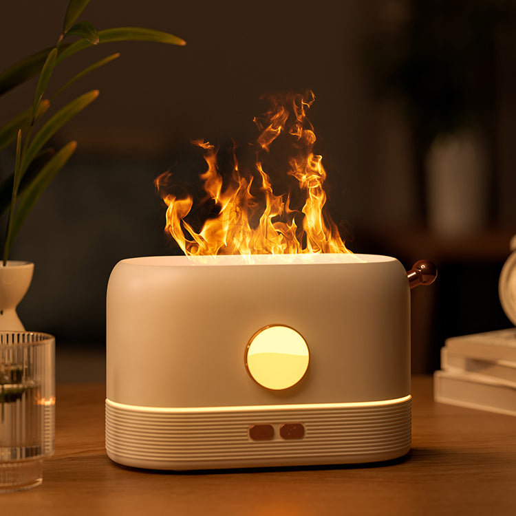 Aromatherapy Essential Oil Diffuser in Action: Tranquil Ambiance Unleashed Product Size: 18.18.510.7cm - Sleek and Compact Design Certification Badges: CE, RoHS, FCC - Quality Assured User-Friendly Operation: English Instruction Manual Included Type-C Cable for Efficient Charging - Convenience at Your Fingertips Spray Function Control: Left Button for Captivating Fragrance Flame Light Control: Right Button for Mesmerizing Visual Effects